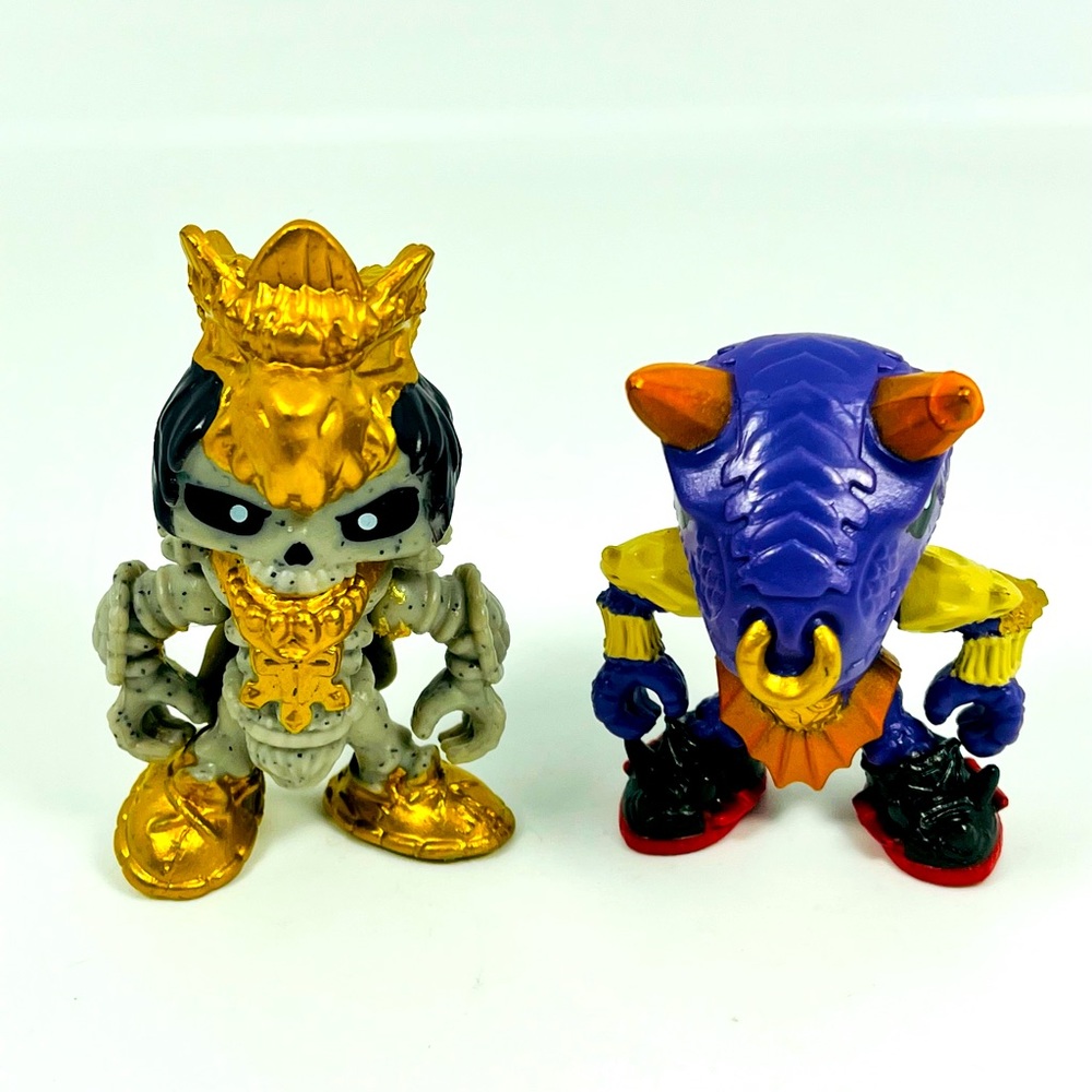 Treasure X Figures Lot Of 2 Skeleton King And Purple Dino Moose Toys
